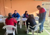 Defensores penitenciarios atendiendo a internos que consultan por sus causas (foto de archivo)